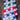 Four checkered flags embroidered with the course logo on a wooden surface.